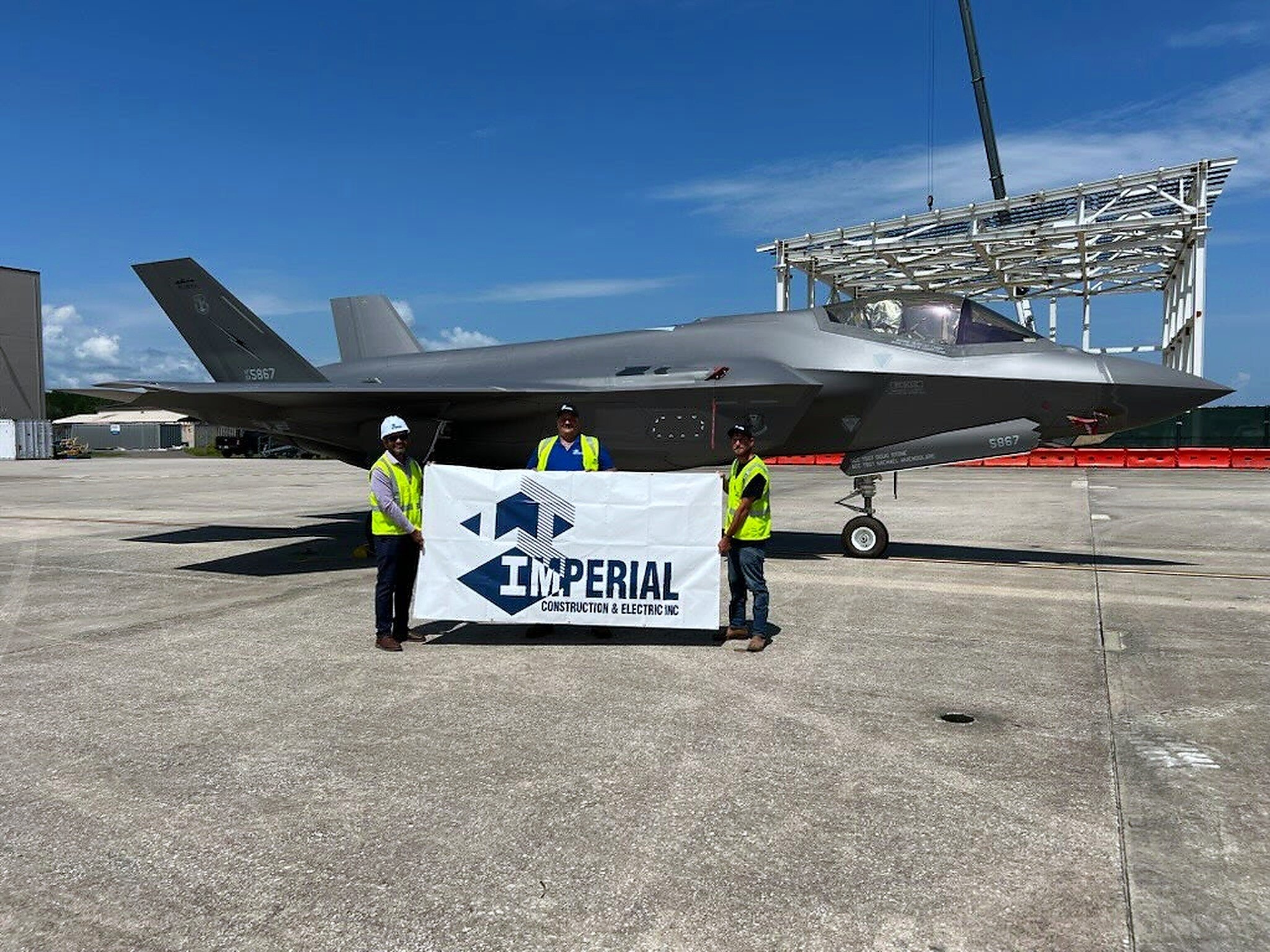 Imperial Construction & Electric crew on the flight line at the F-35 Repair Hangar, Building 1001 — Air National Guard, Jacksonville, Florida